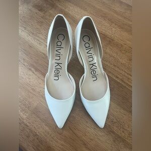 Calvin Klein white low heels. Worn once. Size 5.5.